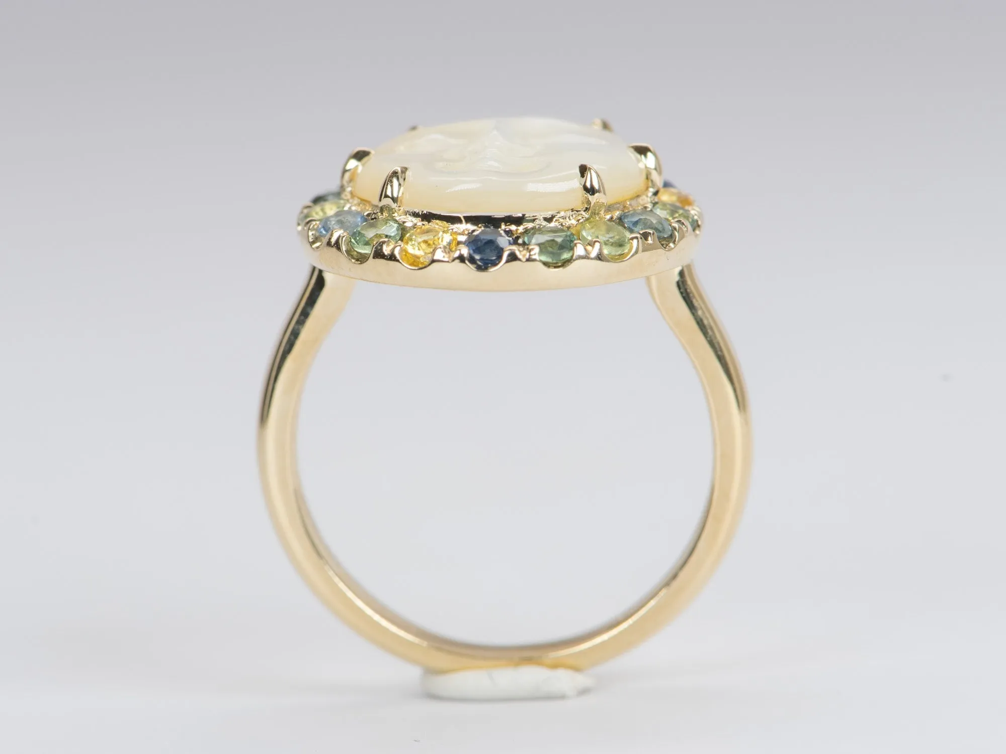 Carved Mother of Pearl Moon Face Disk Ring with Teal Sapphire Gemstone Halo 9K Gold R6367