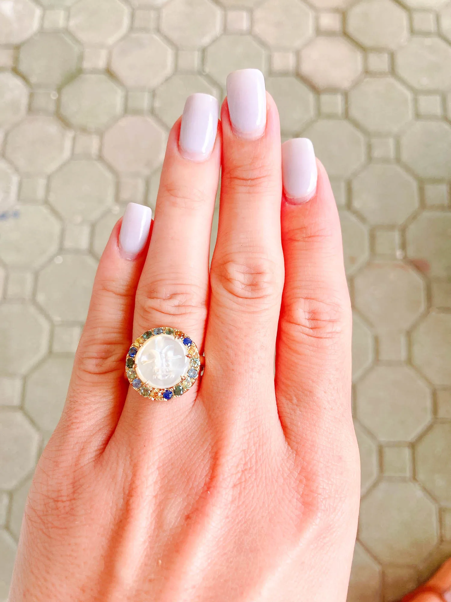 Carved Mother of Pearl Moon Face Disk Ring with Teal Sapphire Gemstone Halo 9K Gold R6367